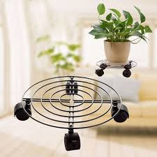 Deck plant stand/wheelermarayai bought these to move heavier plant pots around on my deck. Metal Plant Flower Pot Stand Trolley Caddy On Wheels Indoor Outdoor Home Garden In Pot Trays From Home Kitc Plant Stand Indoor Indoor Plants Metal Flower Pots