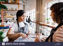 Hostess Discussing Seating Chart Stock Photo 259730207 Alamy