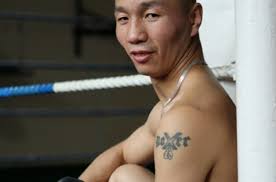 Shinny Bayaar retains British flyweight title
