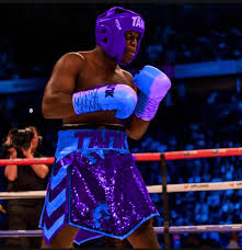 Jake paul defeats deji in boxing match | heavy.com. Deji Boxing Outfit Ideas Since He Likes The Colour Purple Deji