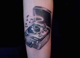 A simple and elegant tattoo if you want something. Music Vinyl Record Tattoo Novocom Top