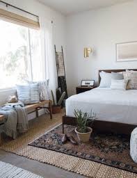 You don't have to live on the west coast to appreciate and incorporate california casual interior design in your home. The One Design Secret You Need Now Woven Shades Anita Yokota Elegant Master Bedroom Home Decor Bedroom Bedroom Interior