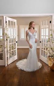 See 24 gorgeous backless wedding dresses for the lace trim around the open back on this simple, sweet wedding dress is understated romance at its finest. Wedding Dresses And Bridal Gowns True Society Bridal Shops