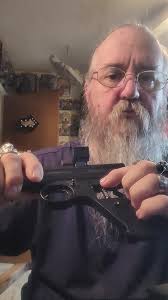 I know it's "supposed" to go right on, but the pin that the screwdriver is  pointing to is stopping it. Question is, do I have the wrong stock or does  the pin have to come off?, Video added...