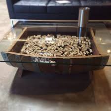 Fill the barrel with corks and display prized bottles under the glass, or use the space to store your favorite wine accessories. Wine Barrel Coffee Table Glass Top Cork By Winebarrelfurniture 515 00 Wine Barrel Coffee Table Barrel Coffee Table Barrel Coffee