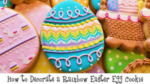 Some fake grass, newspaper, and colored twine. How To Decorate A Rainbow Easter Egg Cookie Youtube