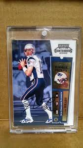 The marc bulger autographed rookie card scott weaver was hoping to obtain when he found his tom brady rookie card commonly sells for between $50 and $100. 2000 Playoff Contenders 144 Tom Brady Autographed Rookie Card Signatu New England Patriots Logo New England Patriots Merchandise New England Patriots Football