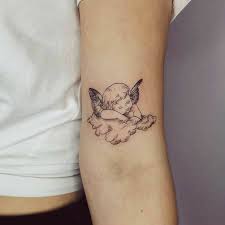 Pin By Julka Terlecka On T A T T O O S Cherub Tattoo Infected Tattoo Family Tattoos