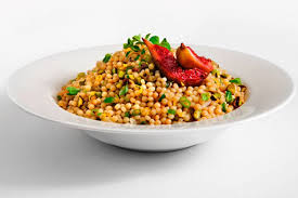Add the garlic and fry for 30 seconds before stirring in the couscous. Fresh Herb Pearl Couscous With Roasted Figs San Remo