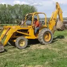 John Deere 302A Backhoe Loader
