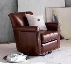 Irving Roll Arm Leather Swivel Armchair With Nailheads Pottery Barn Also ordered irving swivel molasses leather chair for a very small den in a very small 2 br house.