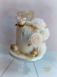 21st Birthday Glamorous Rose Gold Drip Cake White And Gold Drip Cake With Ferrero Rocher And Silk Roses By Storeybook Cakes White Birthday Cakes 25th Birthday Cakes 70th Birthday Cake