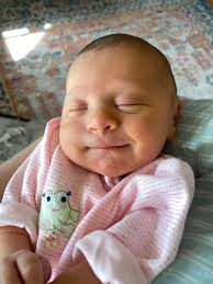 What are some tips or tricks for pumping with the Momcozy M6 breast pump to  improve output?