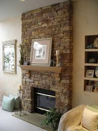 The fireplace and tv combo is a common one which suits small spaces and which simply comes the fireplace can match one of the walls or other design elements in the room. Enchanting Stones Wall Exposed Panels Fireplace Ideas Added Built In Storage In Small S Stone Fireplace Designs Stone Veneer Fireplace Stone Fireplace Surround