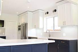 The beautiful cabinet colors that we offer are sure to accent your kitchen countertops and interior space. My Beautiful New Kitchen With Contrasting Midnight Blue And Dove White Kraftmaid Cabinets Unique Kraftmaid Kitchens Kraftmaid Kitchen Cabinets Kitchen Design