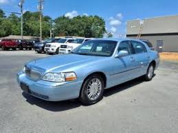 Image result for Light Ice Blue 2006 Town Car