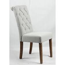 Dramatic button tufting graces the high camel backs. Light Grey Upholstered Dining Chair With Buttoned Backrest