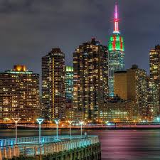 January 6 2017 The Empire State Building S Lights Continue To Twinkle In Red And Green With A Candy Cane St Empire State Building Visit New York Empire State