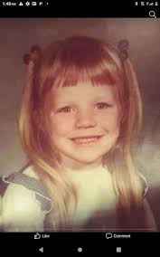 My mom was so mad because a few days before picture a friend of mine took  scissors and cut my bangs.