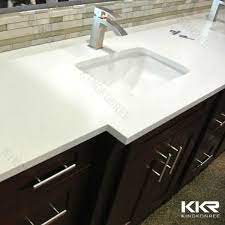 When you see the term integrated used in reference to a vanity top, it means the sink basin is already incorporated into the vanity top—either because it is molded into the countertop material itself (known as a fused sink), or is attached below the vanity top at the factory. One Piece Bathroom Sink And Countertop Molded Sink Countertop Buy Molded Countertop One Piece Count Bathroom Countertops Bathroom Countertops Diy Countertops