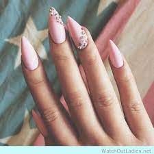 This nail idea is pink, pretty, and elegant to its core. Matte Pink Nails With Diamonds Matte