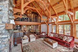 If you're looking for small living room ideas with a tv, consider mounting the television to the wall or investing in a very thin table to hold it. Timber Frame Great Rooms By Davis Frame Company