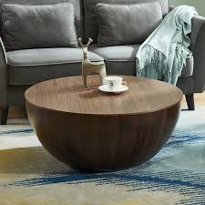 It has storage space, giving you a place to stow away everything from the tv remote to a stack of magazines. Round Drum Coffee Table With Storage Walnut Bowl Shaped Coffee Table Coffee Tables Living Room Furniture Furniture