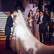 Initially dressed in traditional chinese wedding attire, xiaoming and angelababy later changed into a suit and gown for the exchanging of vows. How China S Us 31m Wedding Of The Decade Boosted Sales For A 200 Year Old French Jeweller South China Morning Post