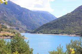 This friendly club offers you a wellness break to recharge your batteries. The Lac Du Serre Poncon A Beautiful Lake Surrounded By Mountains