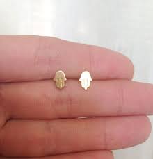 Michal golan, our most prolific artist of hamsa jewelry, makes her hamsa earrings out of 24k gold or sterling silver electroplated over brass or white metal. Gold Hamsa Earrings Studs Earrings Small Post Earrings Etsy Hamsa Earrings Stud Earrings Small Earrings Studs