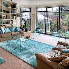 Without a pad, foot traffic will quickly diminish the ability of the fibers to spring back after being material: Aqua Teal Sea Rug Art Silk Sonya Winner Vibrant Contemporary Rugs