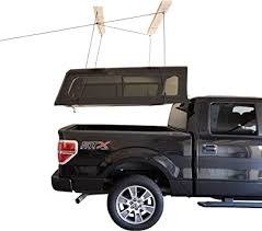 In this spacious garage (1,120 square feet) a double car lift increases the parking space. Amazon Com Harken Truck Hardtop Garage Storage Hoist 8 1 Mechanical Advantage Lift Single Person Pulley Compatible With Toyota Ford Chevrolet Nissan Automotive