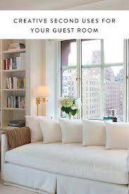 The dark finish of the cabinets coordinates well with the bedding and furnishings for a crisp, tailored look. Swing Rooms Are In Here S How To Use One Via Purewow Guest Room Office Home Home Decor