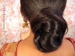 A low, loose bun for long hair is a great option for disguising your hair elastic. Pin On Oh Those Marvelous Tresses