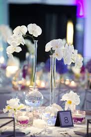 7 centerpieces is a wedding design blog showcasing chic and stylish texas weddings from the pan handle to the valley. Inside Weddings Orchid Centerpieces Wedding Silver Wedding Decorations Orchid Wedding