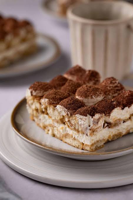 10-Minute Tiramisu for Two served in glasses with a dusting of cocoa
