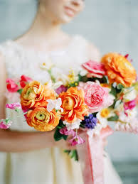 Orange wedding flower guide for all of your wedding floral arrangements and bouquets. Bright Spring Wedding Floral Ideas Wedding Sparrow Best Wedding Blog Wedding Ideas Orange Wedding Bouquet Wedding Bouquets Wedding Flowers