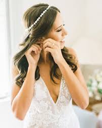 Keep reading for a peek at some of our favorite wedding hairstyles with veil ideas add a feminine touch to a beautiful beaded headband by pairing it with a low bun. Half Up Half Down Wedding Hairstyles We Love Martha Stewart