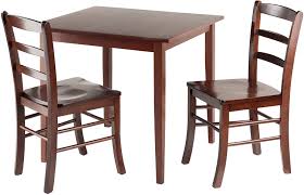 When it comes to essential furniture for your home, a beautiful dining table can really make your dining room stand out. Amazon Com Winsome Groveland Square Dining Table With 2 Chairs 3 Piece Table Chair Sets
