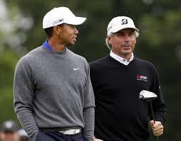 Tiger Woods And Fred Couples Talk As They Walk Off The Tee On The First Hole During The Second Round Of The Memorial Tournamen Famous Golfers Fred Couples Golf