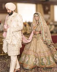 Sanya and Lalit's Anand Karaj wedding is pure elegance! Sanya stuns in her  intricately detailed lehenga, while Lalit looks dapper in his stylish  sherwani. They're truly serving looks and love!❤️ And don't
