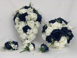 I always love when brides plan a season wedding using unexpected colors. Artificial Wedding Flowers Package Navy Blue And Ivory