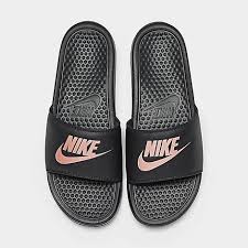 Women's nike benassi just do it. sandal is a lightweight sports slide with the nike corporate logo embellished on the strap. Women S Nike Benassi Jdi Swoosh Slide Sandals Finish Line