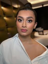 Who can recommend a makeup artist in Tampa for a wedding with experience in  Indian/brown skin tones?