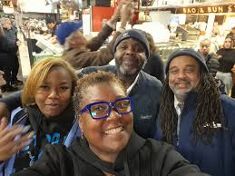 Detroit lions fan meets team bus drivers