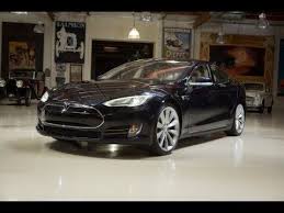 I Can Not Believe What Jay Does To The Tesla S Featured In Jay Leno S Garage A 100 Electric Car Can Do This Jay Leno Garage Top Cars Tesla Model S