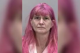 Georgia woman accused of burying mom's corpse in backyard
