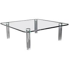 Large rustic farmhouse coffee table, provincial brown top, creamy white distressed base, large square coffee table with shelve. Large Square Rounded Corners Glass Top Coffee Table On Cylinder Lucite Legs 3 4 At 1stdibs