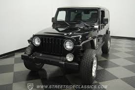 Image result for Brilliant Black 2005 Jeep