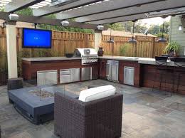 The soapstone countertop is 36″ high. 20 Spectacular Outdoor Kitchens With Bars For Entertaining